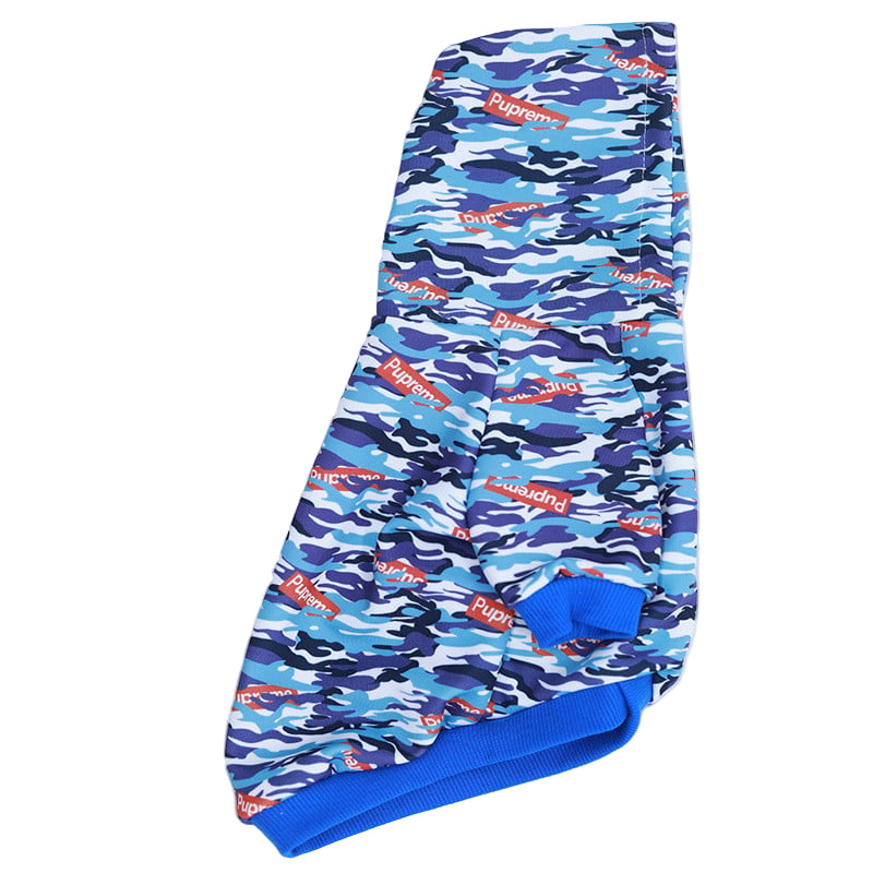 Blue camouflage dog coat with visible branding on a white background