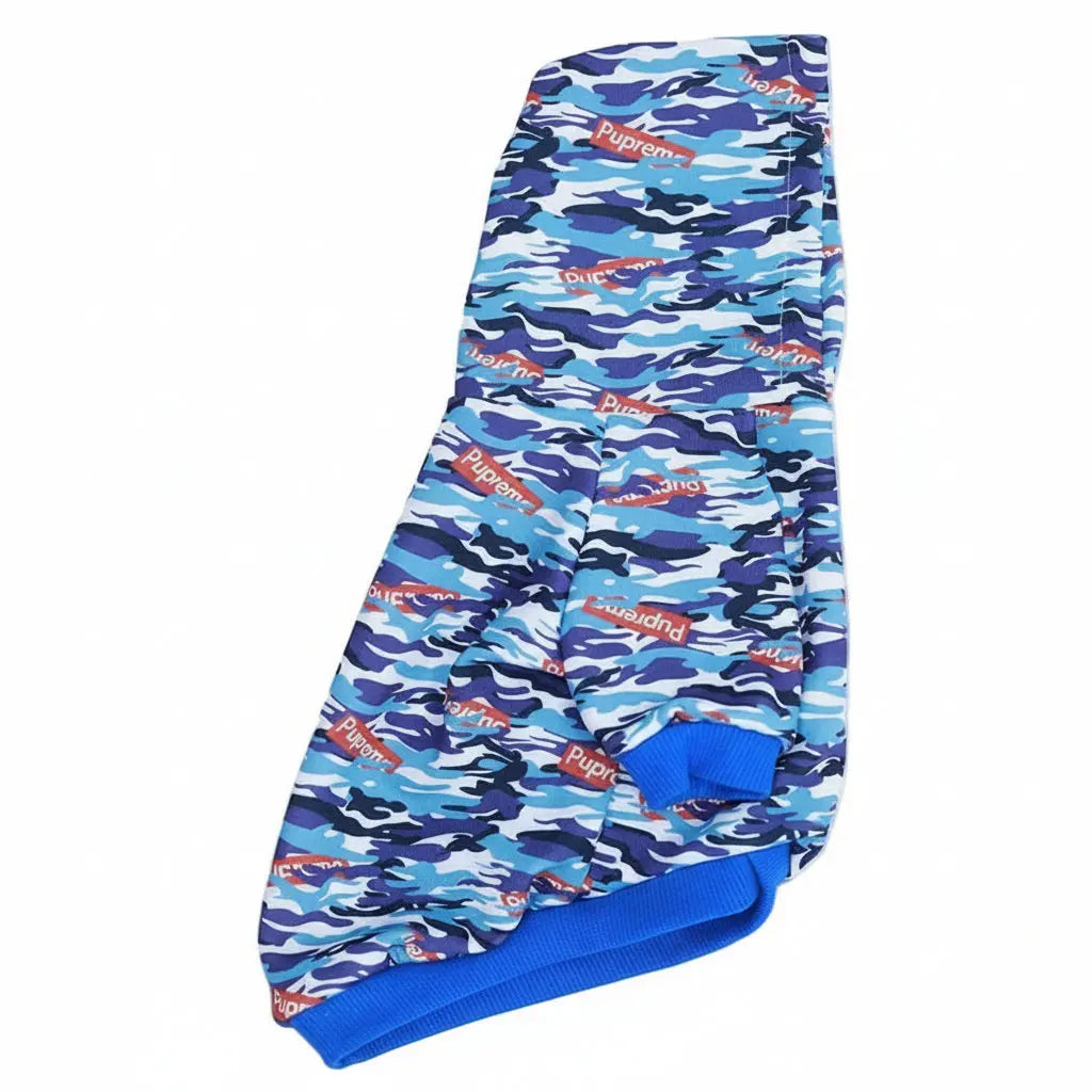 Blue camouflage dog coat with visible branding on a white background