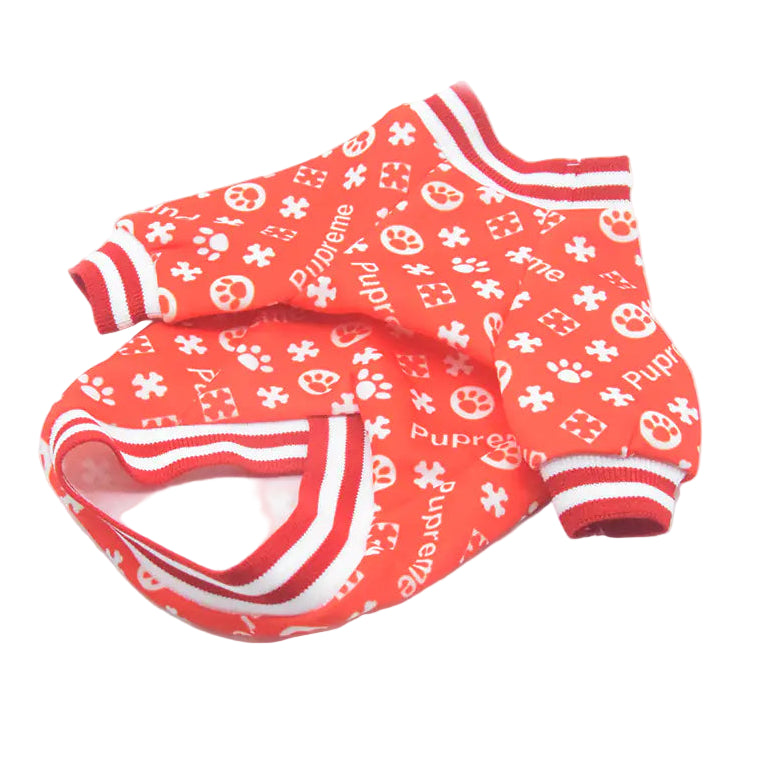 Red pet outfit with white patterns on a white background