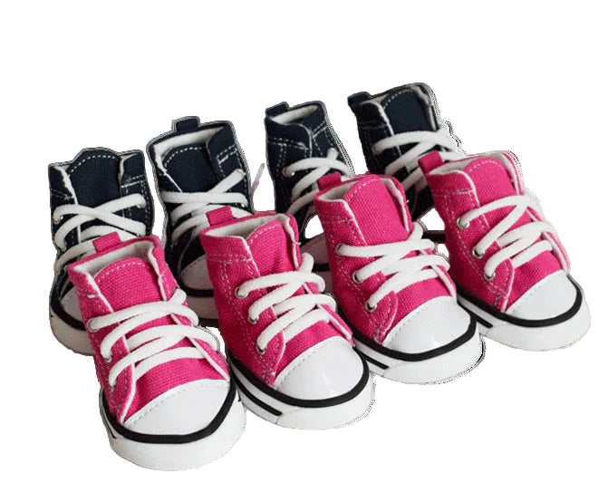 Set of pink and black high-top sneakers on a white background