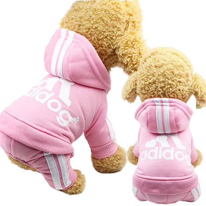 Pink dog hoodie with white stripes and 'adidas' branding on a white background.