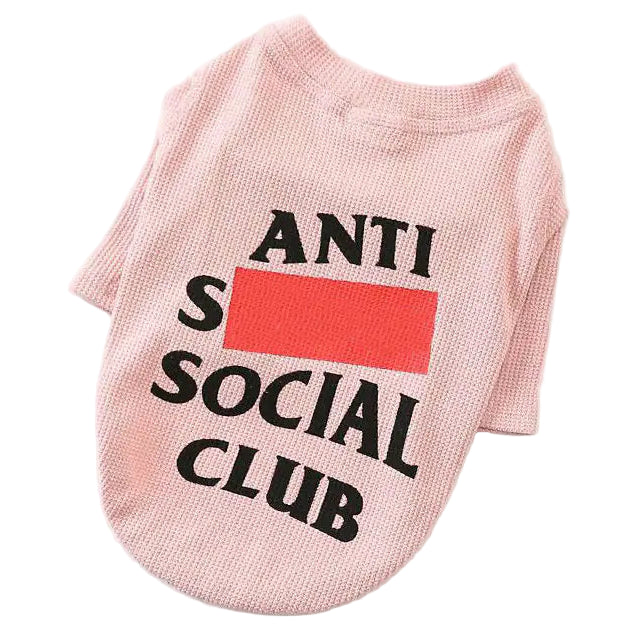 Pink dog shirt with 'ANTI SOCIAL CLUB' text on a white background