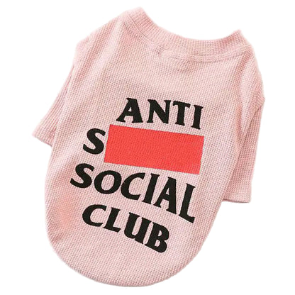 Pink dog shirt with 'ANTI SOCIAL CLUB' text on a white background