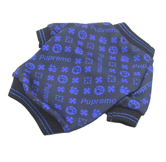 Blue and gray patterned dog sweater with 'Pupreme' branding on a white background