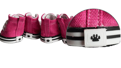 Pink high-top sneakers with paw print details on a white background