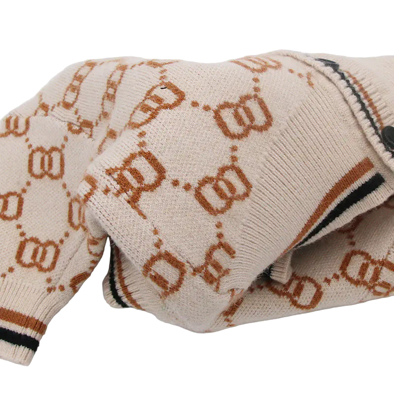 Beige sweater with a pattern on a white background