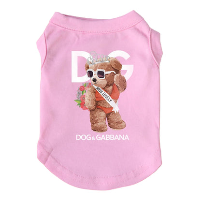 Pink dog shirt with teddy bear graphic and 'Dog of Gabbana' text on a pink background