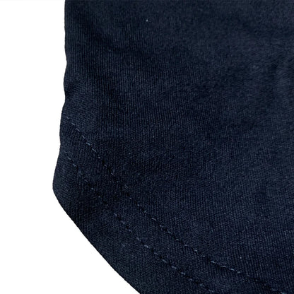 Close-up of a black fabric texture on a white background