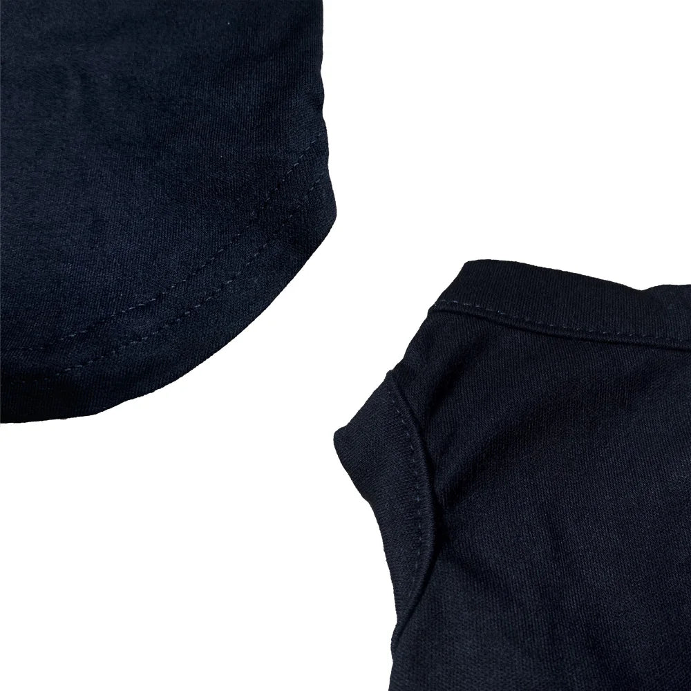 Close-up of a black shirt collar and sleeve on a white background