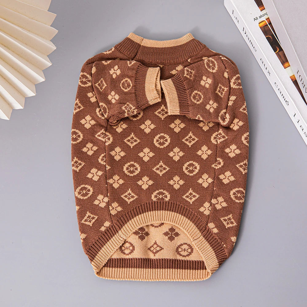 Brown patterned dog sweater on a gray background