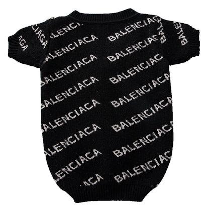 Black dog sweater with Balenciaga branding on a blue background