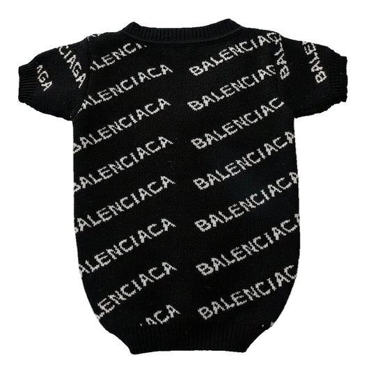 Black dog sweater with Balenciaga branding on a blue background