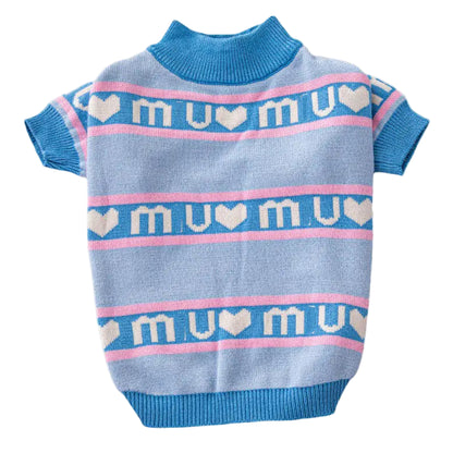Blue dog sweater with 'mu mu' pattern on a white background