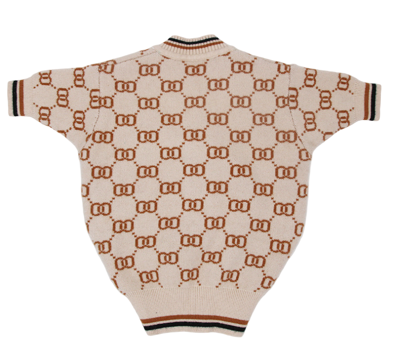 Beige sweater with a pattern on a white background