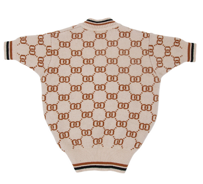 Beige sweater with a pattern on a white background