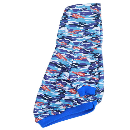 Blue camouflage dog coat with visible branding on a white background