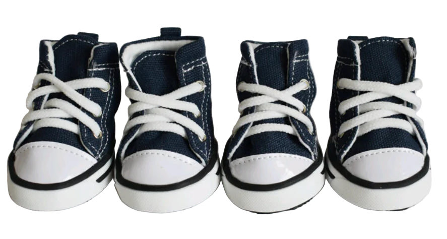 Four pairs of navy blue and white high-top sneakers on a white background