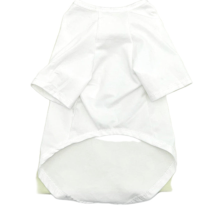 White baby outfit with a green and brown bag on a white background