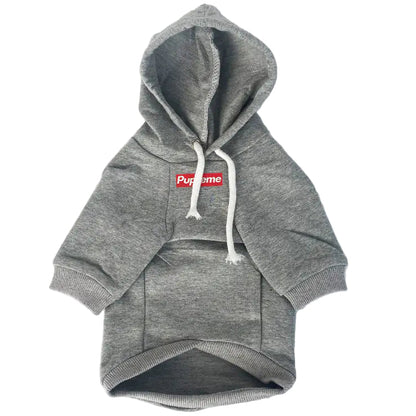 Gray hoodie with a red Supreme logo on a white background