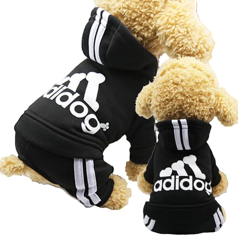 Black 'adidog' pet hoodie with white text and stripes on a light background