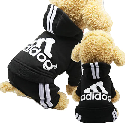 Black 'adidog' pet hoodie with white text and stripes on a light background